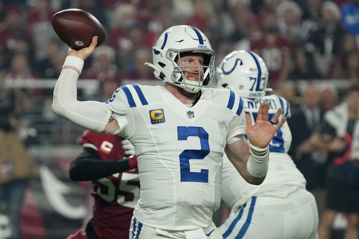 Indianapolis Colts quarterback Carson Wentz passes against the Arizona Cardinals.