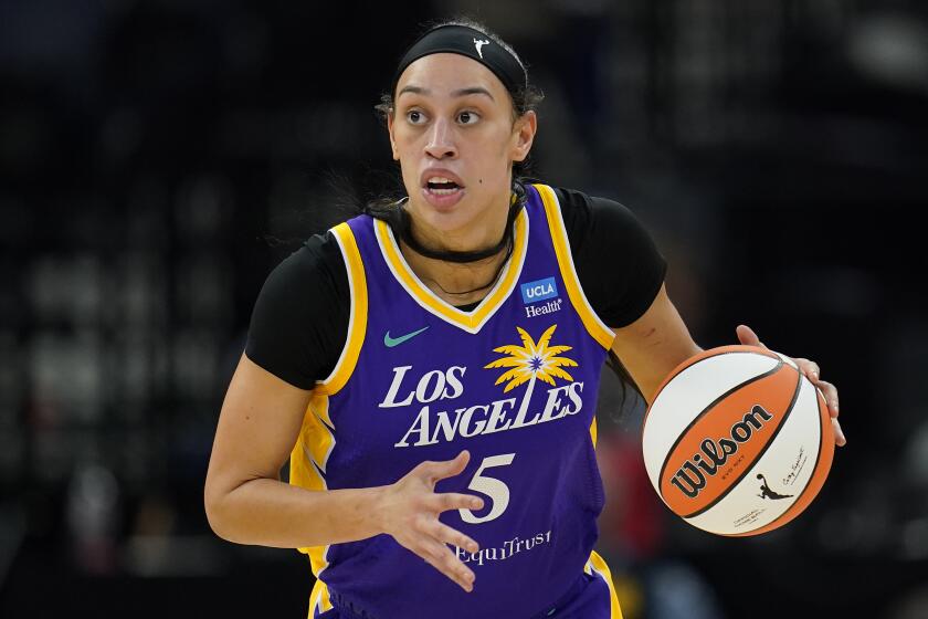 FILE - Los Angeles Sparks forward Dearica Hamby dribbles down the court during the first half of a WNBA basketball against the Minnesota Lynx, game Sunday, June 11, 2023, in Minneapolis. Hamby is replacing Los Angeles Sparks teammate Cameron Brink, who suffered a torn ACL last week, on the U.S. Olympic 3x3 basketball team. (AP Photo/Abbie Parr, File)