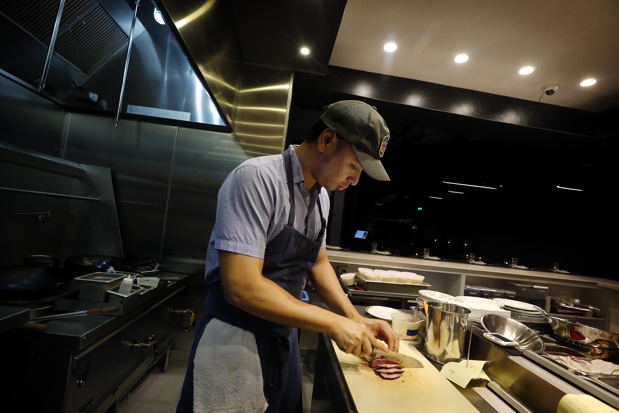 Shawn Pham works in Simbal's kitchen.