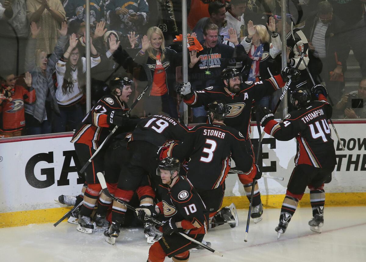 The Ducks celebrate Matt Beleskey's game-winning goal in overtime of Game 5 of the Western Conference finals. The Ducks lead the Blackhawks in the best-of-seven series, three games to two.