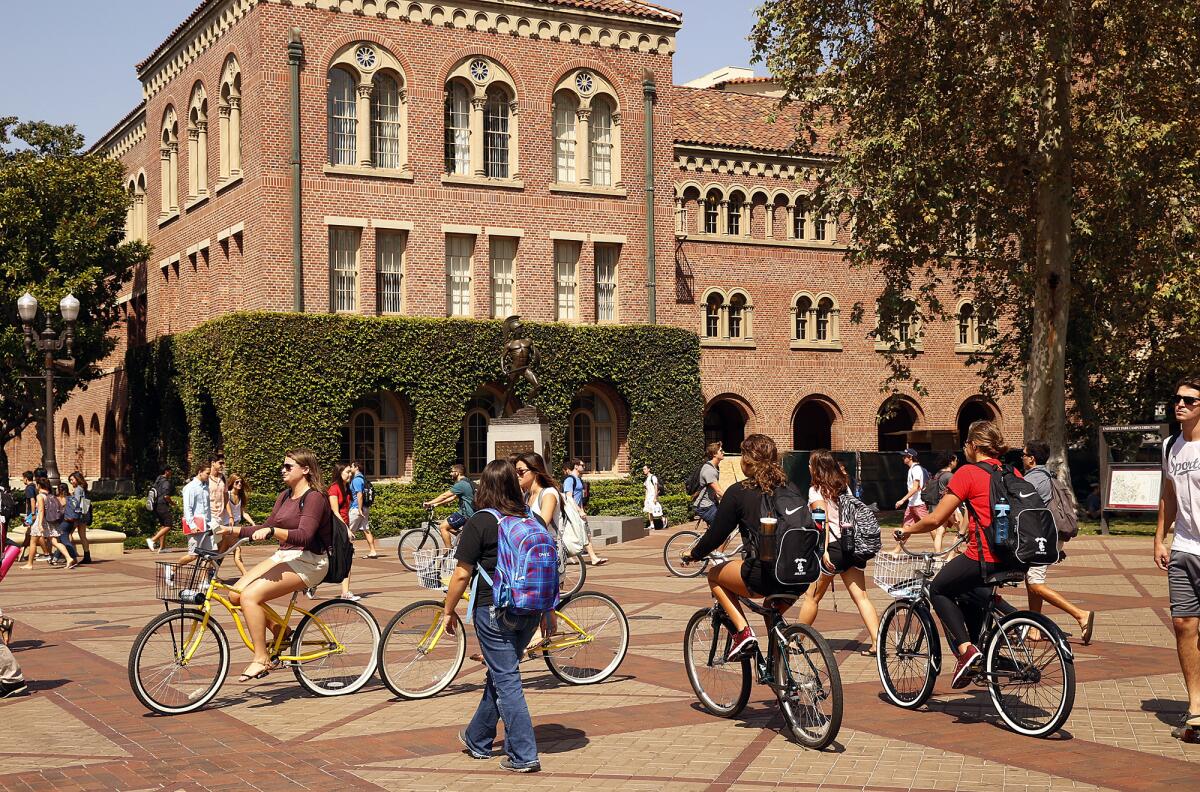 Students traverse  across the USC campus. 