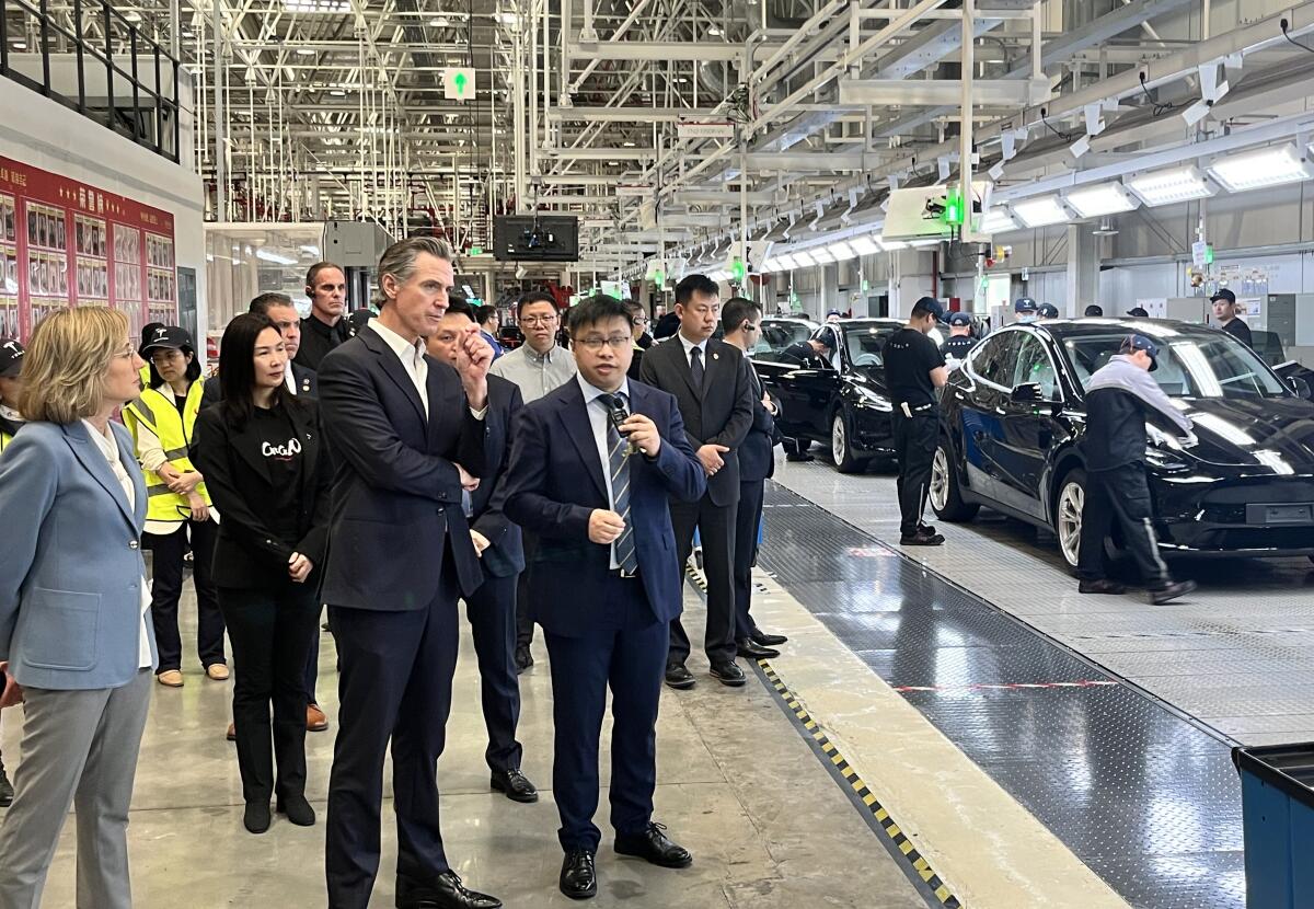 Gov. Gavin Newsom tours a Shanghai factory.