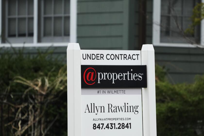 An "Under Contract" sign is displayed at a home in Wilmette, Ill., Thursday, March 28, 2024. On Thursday, April 25, 2024, Freddie Mac reports on this week’s average U.S. mortgage rates. (AP Photo/Nam Y. Huh)