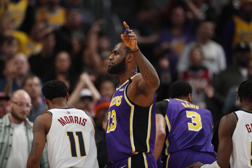 Los Angeles Lakers forward LeBron James (23) in the second half overtime of an NBA basketball game Wednesday, Feb. 12, 2020, in Denver. The Lakers won 120-116 in overtime. (AP Photo/David Zalubowski)