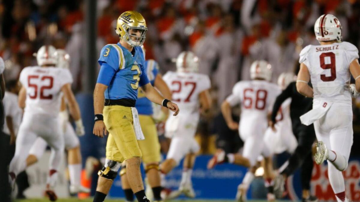 UCLA quarterback Josh Rosen walks off the field after fumbling the ball away on the final play of the game against Stanford on Sept. 24.