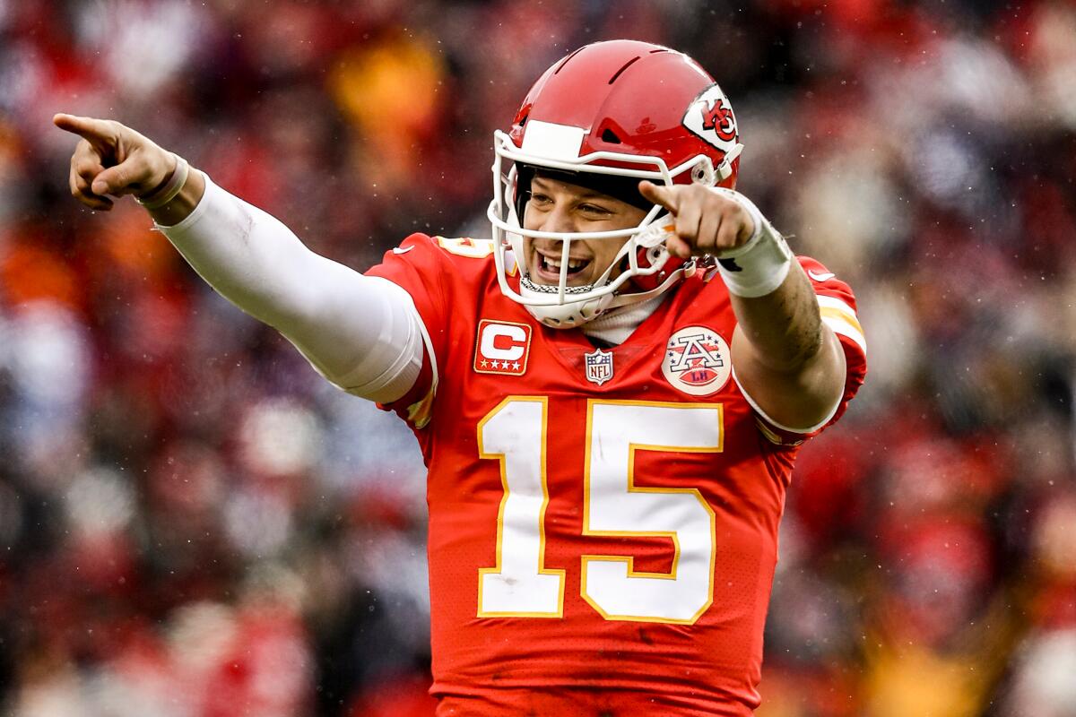 Chiefs quarterback Patrick Mahomes celebrates after throwing a touchdown pass against the Colts in the playoffs last season.