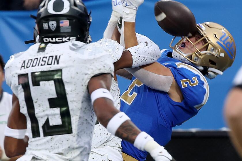 PASADENA, CALIF. - OCT. 23, 2021. UCLA wide receiver Kyle Phiiips can't pull in a pass.