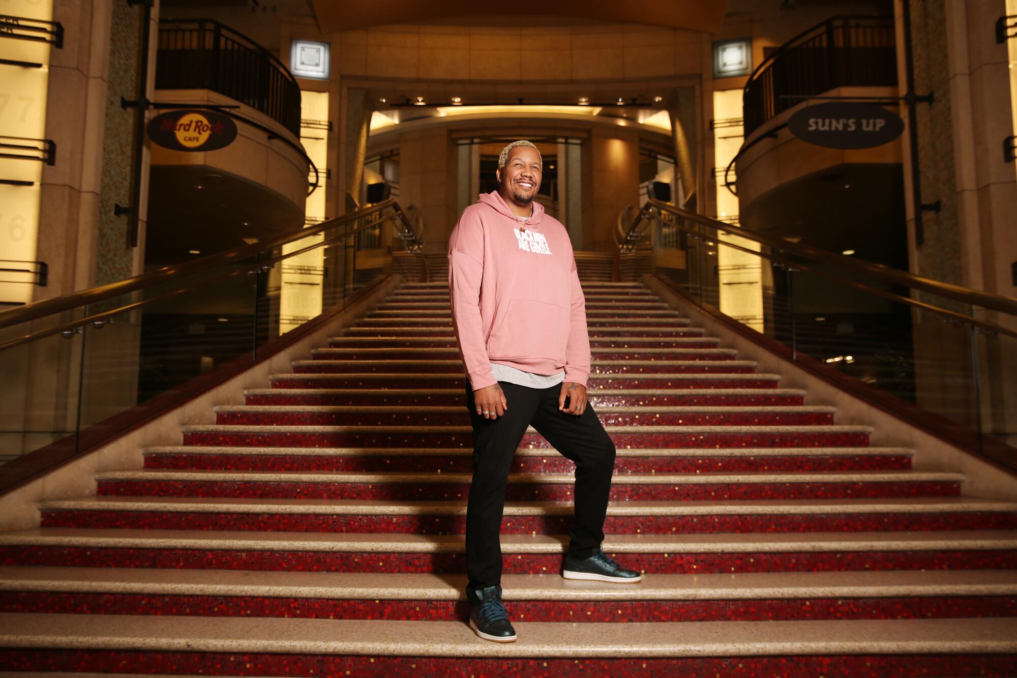 Travon Free stands on the steps of the Dolby Theater in Hollywood.