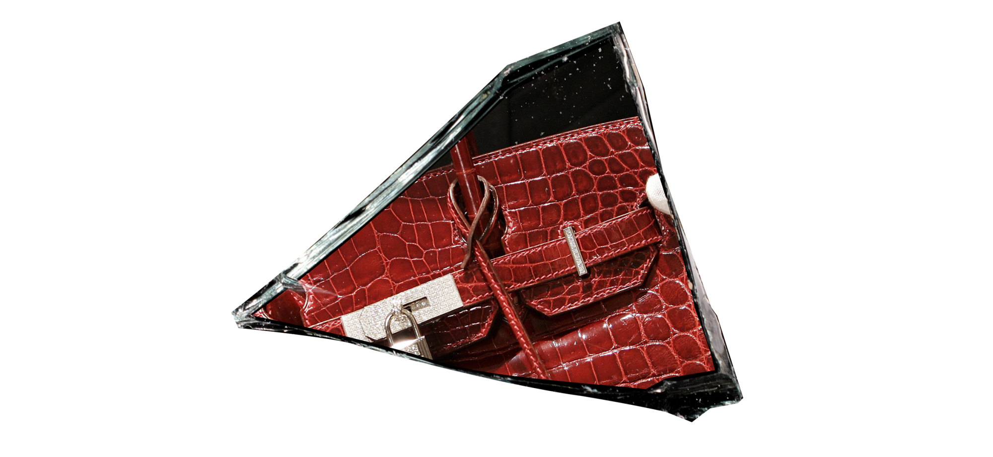 A burgundy Birkin bag superimposed onto a dark shard of glass