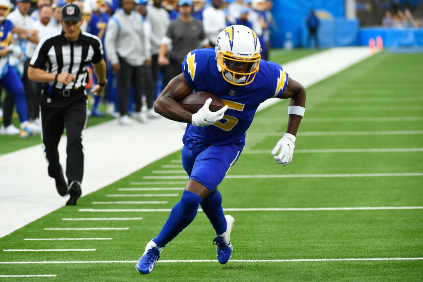 Chargers receiver Joshua Palmer runs for a touchdown as a rookie last season.