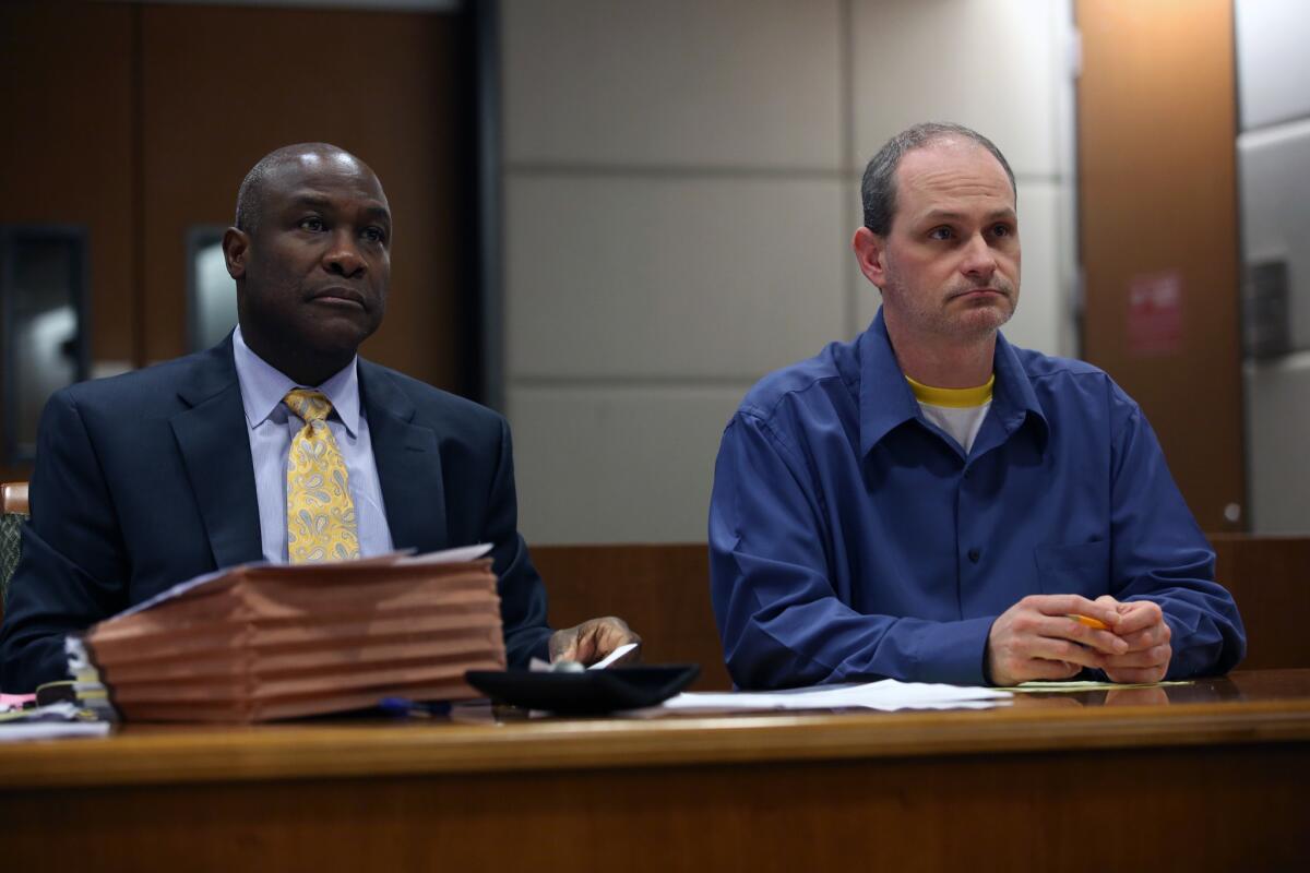 Nathan Louis Campbell, right, was sentenced to 42 years to life in prison. He is shown in court with attorney James Cooper III before the start of closing arguments.