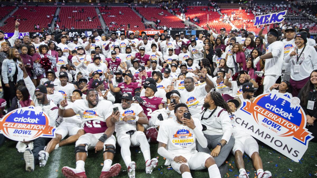 North Carolina Central gather for a group photo after the Celebration Bowl game against Jackson State.