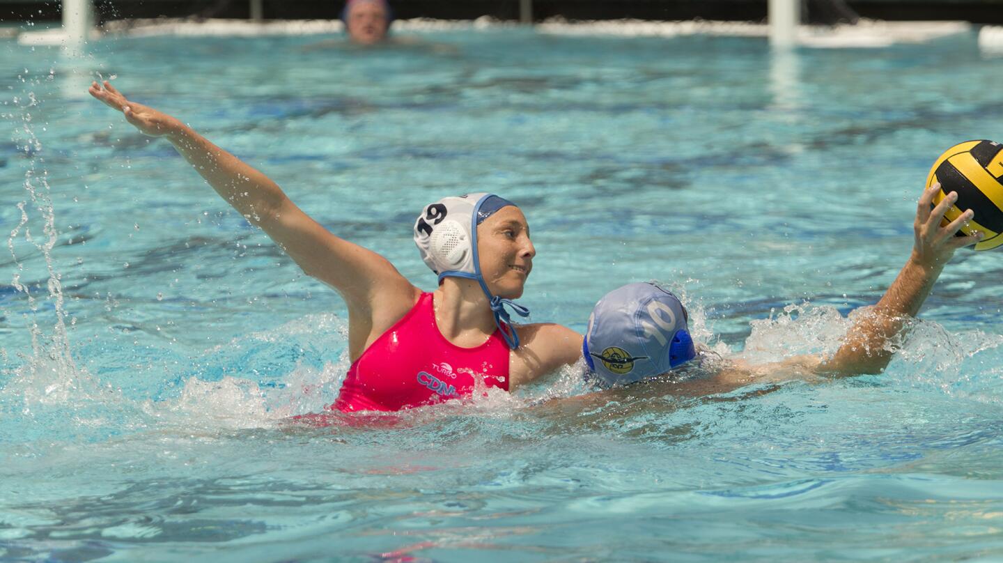 Photo Gallery: Corona del Mar High Girls' Water Polo Team vs. Senior Football players in a water polo game