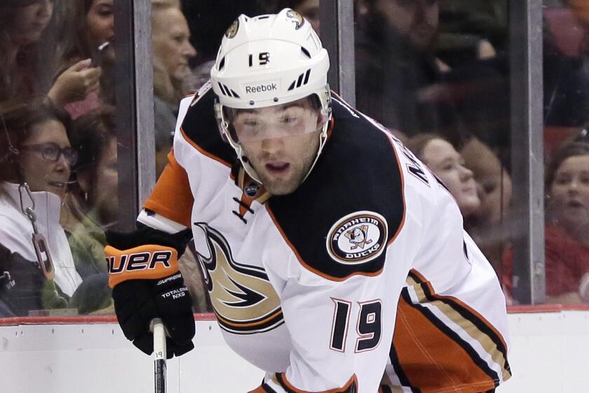 Ducks forward Patrick Maroon plays the puck during a win over the Detroit Red Wings Oct. 11.