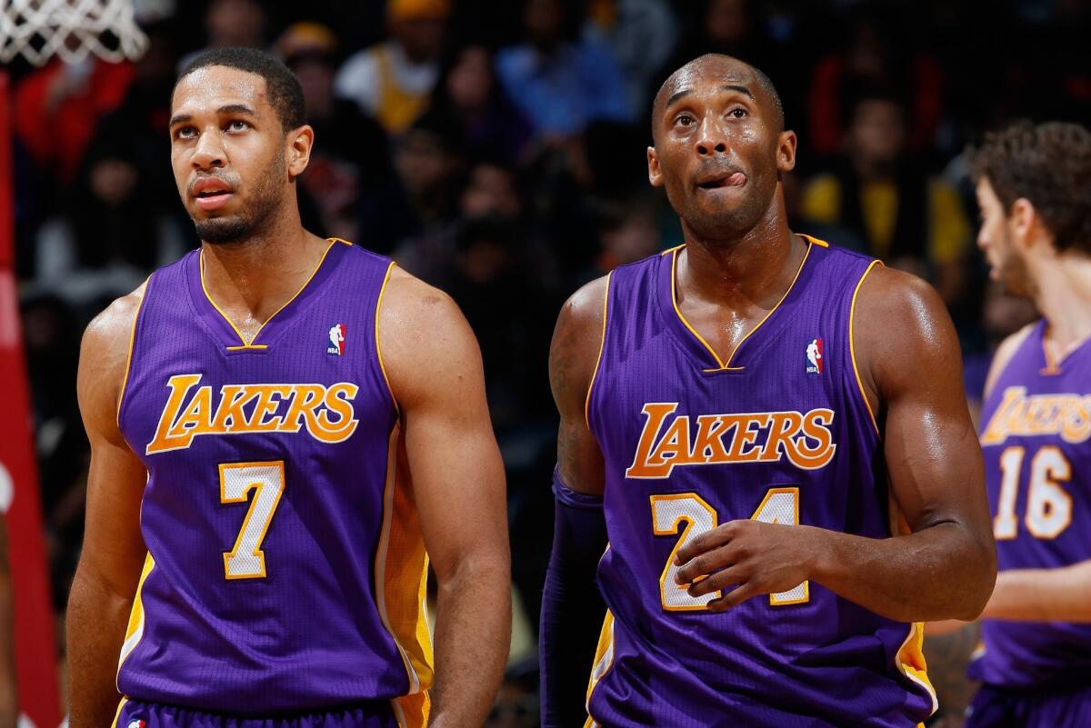 Kobe Bryant and Xavier Henry (7) in a 2013 game. Like Bryant two seasons ago, Henry has ruptured his left Achilles' tendon.