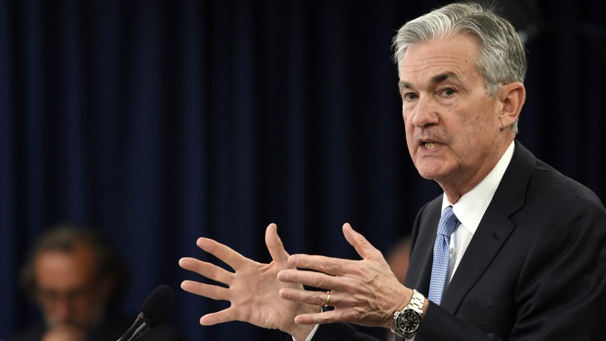 Federal Reserve Chair Jerome Powell speaks during a March 20 news conference in Washington.