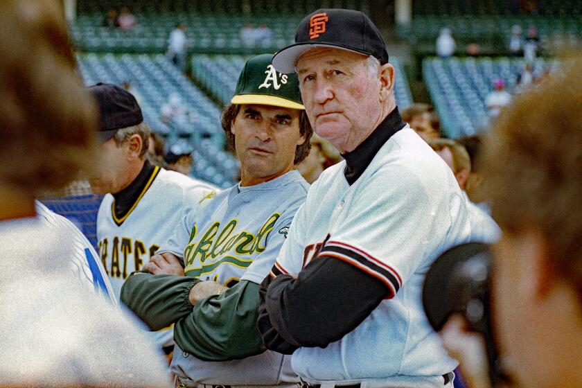 American League manager Tony La Russa, left, from the Oakland A's and National League manager Roger Craig.