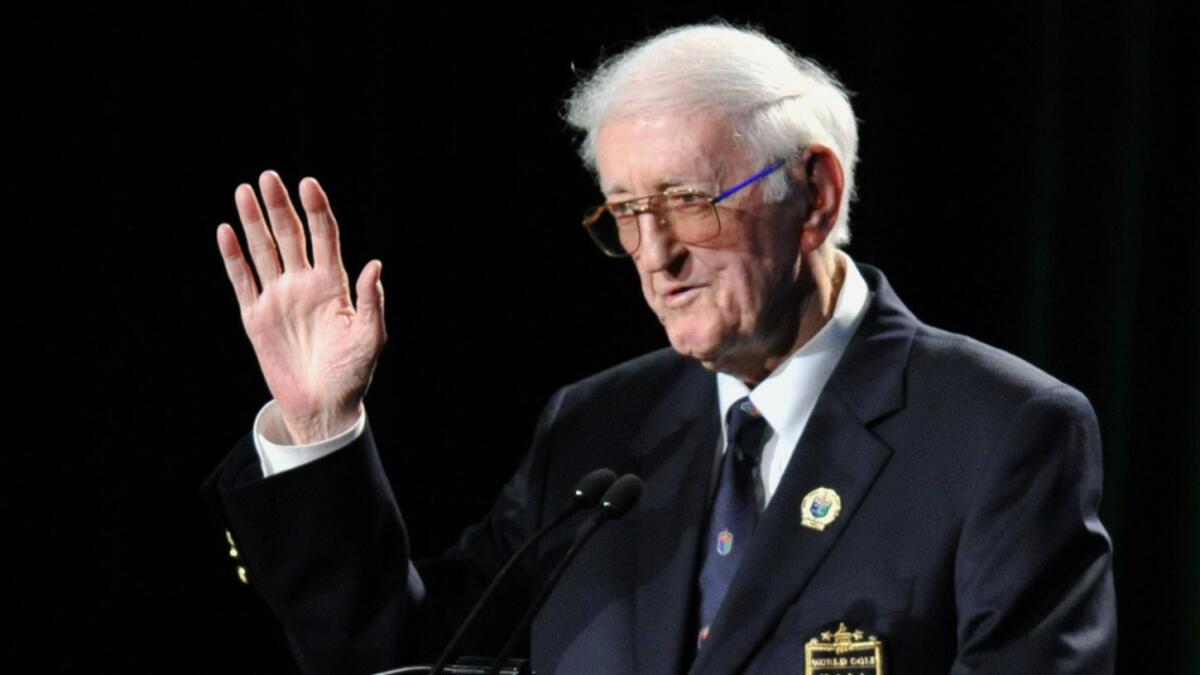 Sportswriter Dan Jenkins speaks after receiving the lifetime achievement award during the World Golf Hall of Fame inductions at World Golf Village in St. Augustine, Fla., in May 2012.