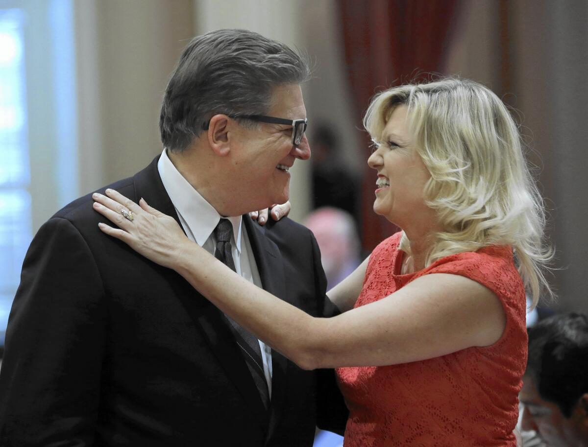 State Sen. Bob Hertzberg (D-Van Nuys) and Cathleen Galgiani (D-Stockton) greet each other as lawmakers return Monday to the Capitol after their summer recess.