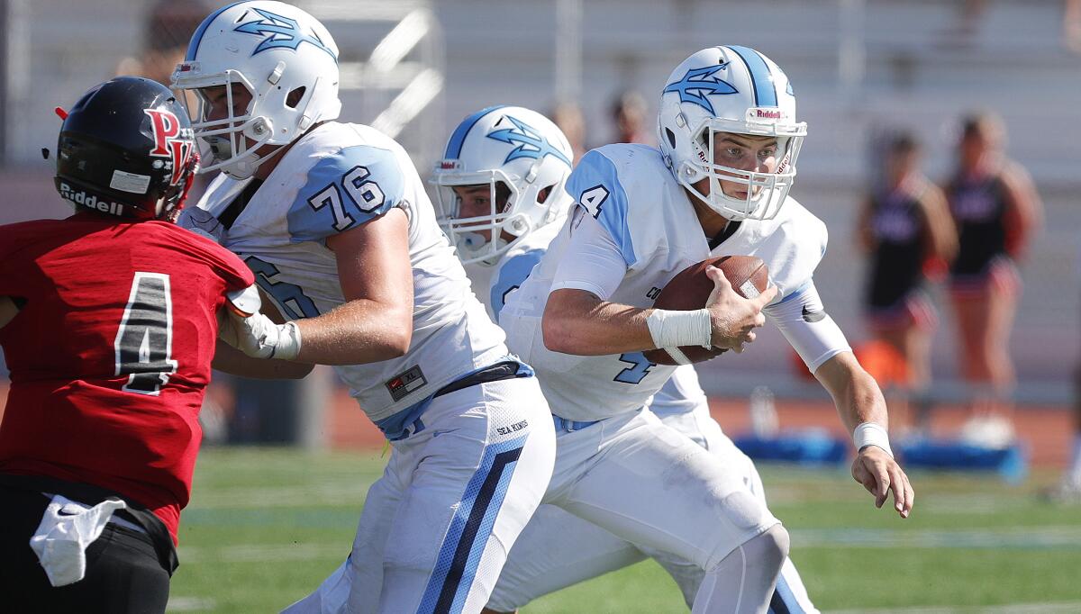 Corona del Mar quarterback Ethan Garbers carries the ball against Palos Verdes on Friday.