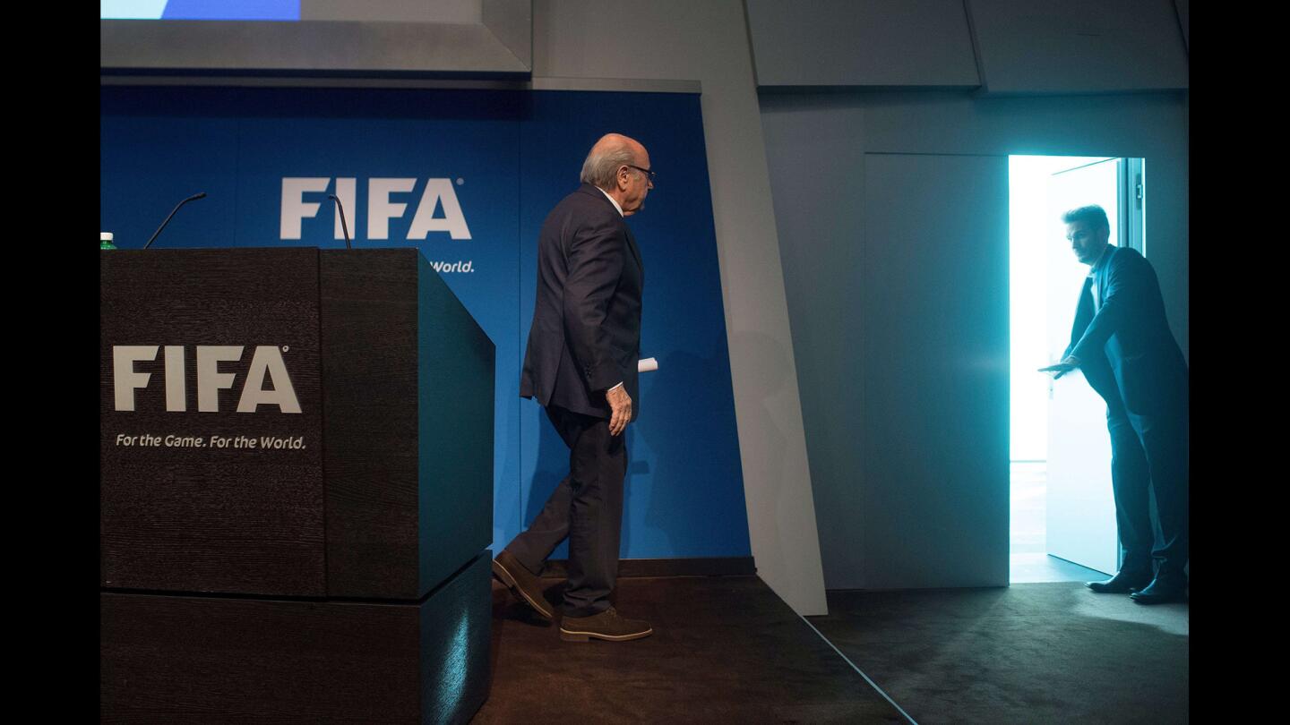 FIFA President Sepp Blatter leaves the podium after announcing his resignation as head of the governing body of world soccer in Zurich, Switzerland, on June 2, 2015.