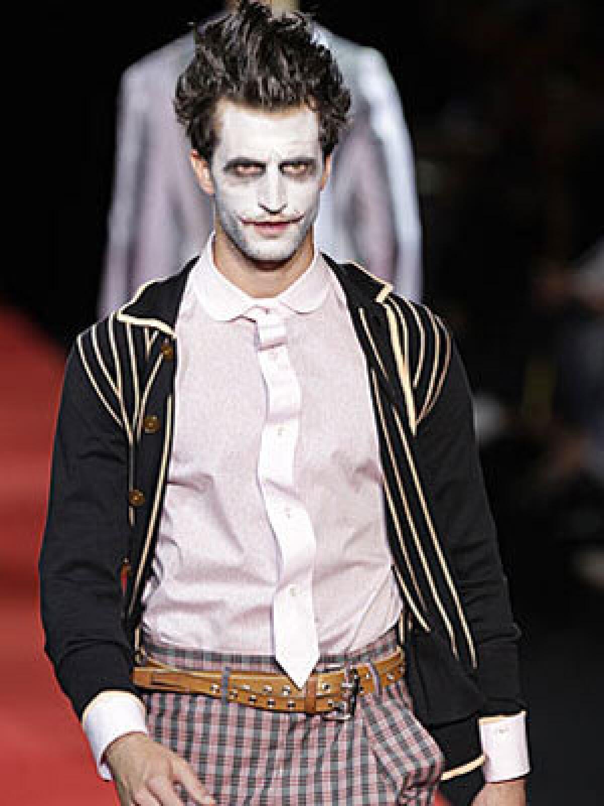 VIVIENNE WESTWOOD: Joker-like makeup mixes with an Old Hollywood aesthetic.