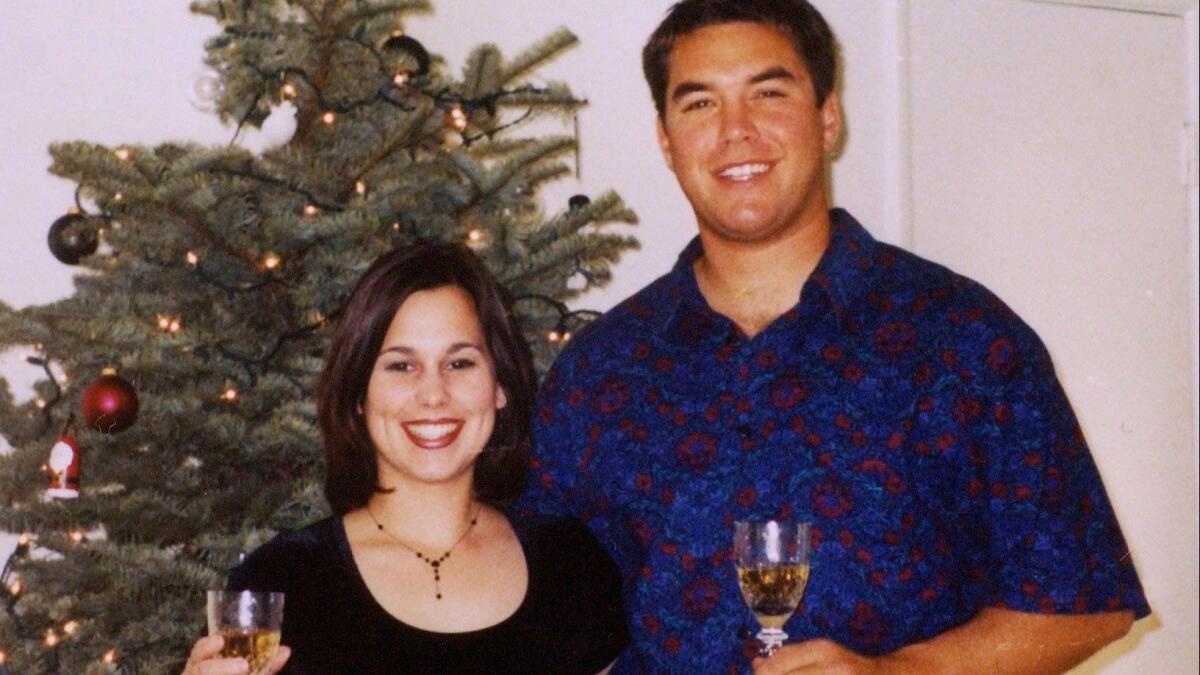 Laci Peterson and her husband Scott Peterson pose for a picture in this undated family photo.