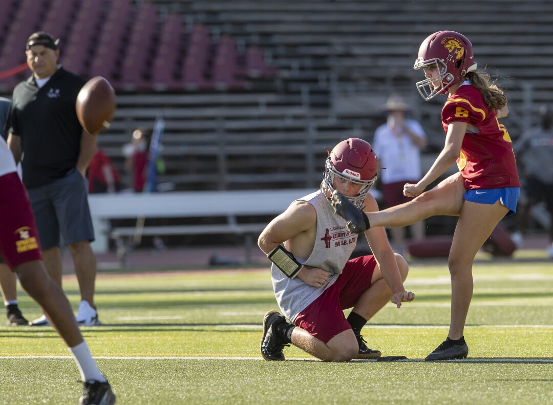 La Canada kicker Shaina Clorfeine attempts a kick during practice.