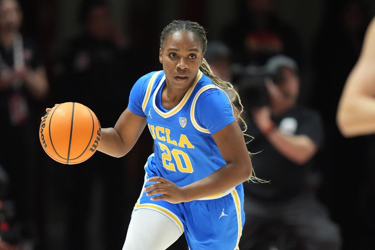 UCLA guard Charisma Osborne controls the ball against Utah on Jan. 22.