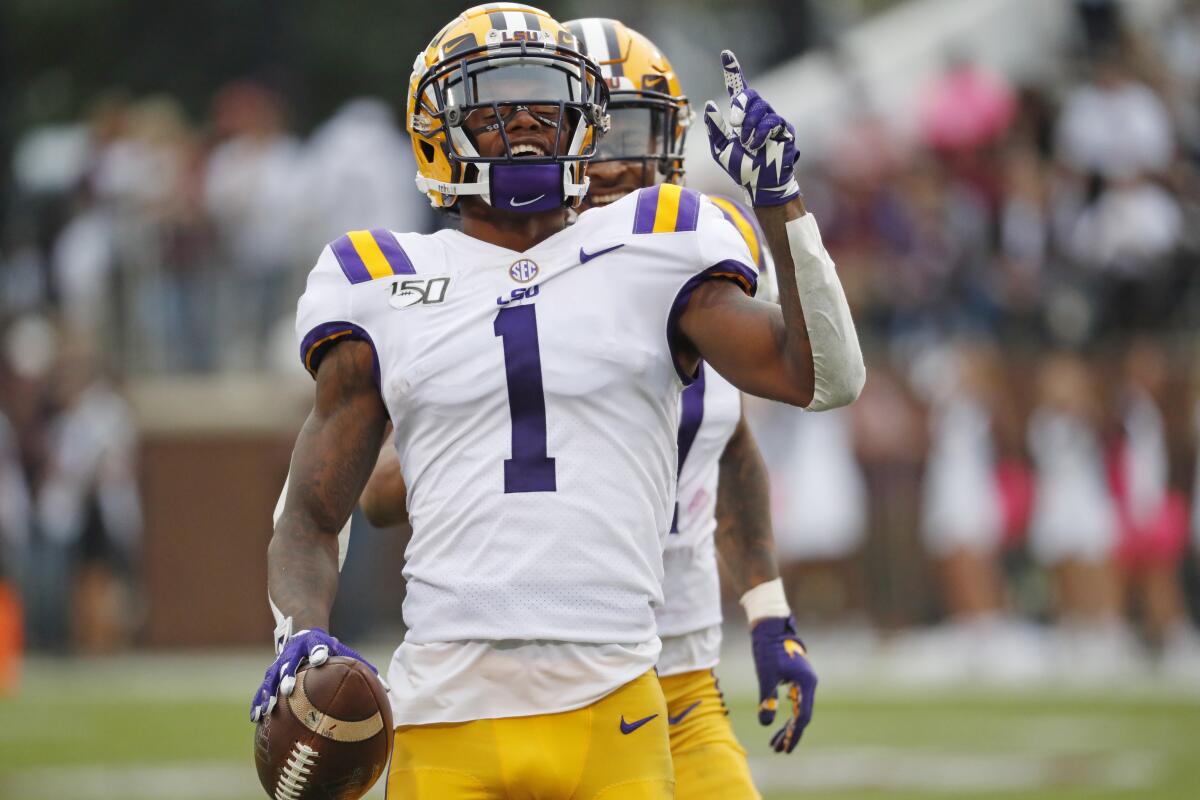 LSU wide receiver Ja'Marr Chase celebrates during a game.