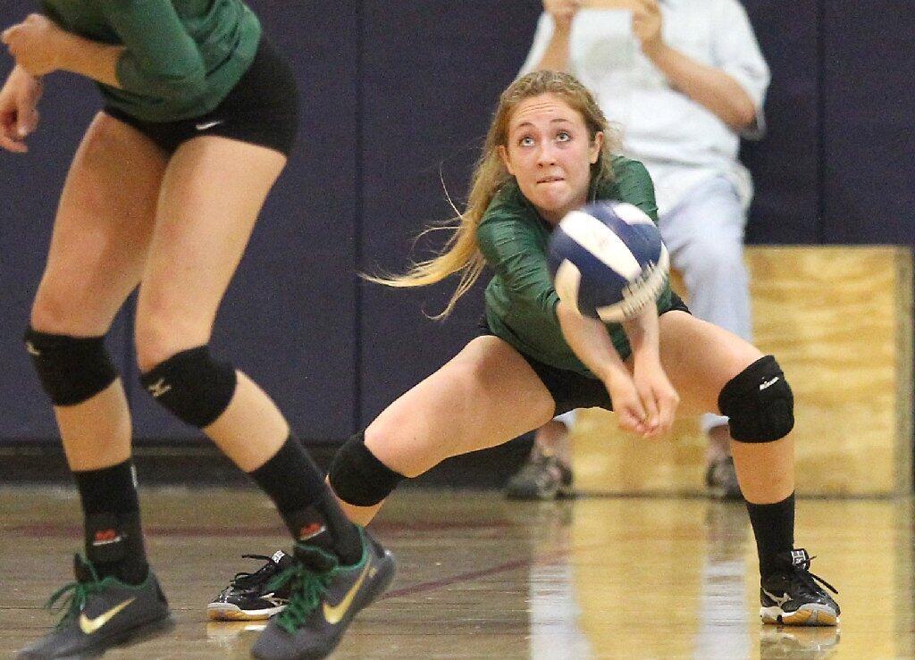 Sage Hill's Giordana Ricci digs a ball to keep a long rally alive against St. Margaret's on Tuesday.