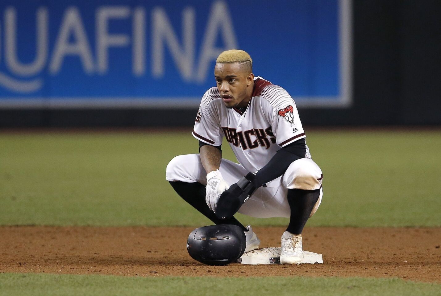 Arizona Diamondbacks' Ketel Marte pauses at second base during the second inning of a baseball game against the Los Angeles Dodgers Wednesday, Sept. 26, 2018, in Phoenix. (AP Photo/Ross D. Franklin)