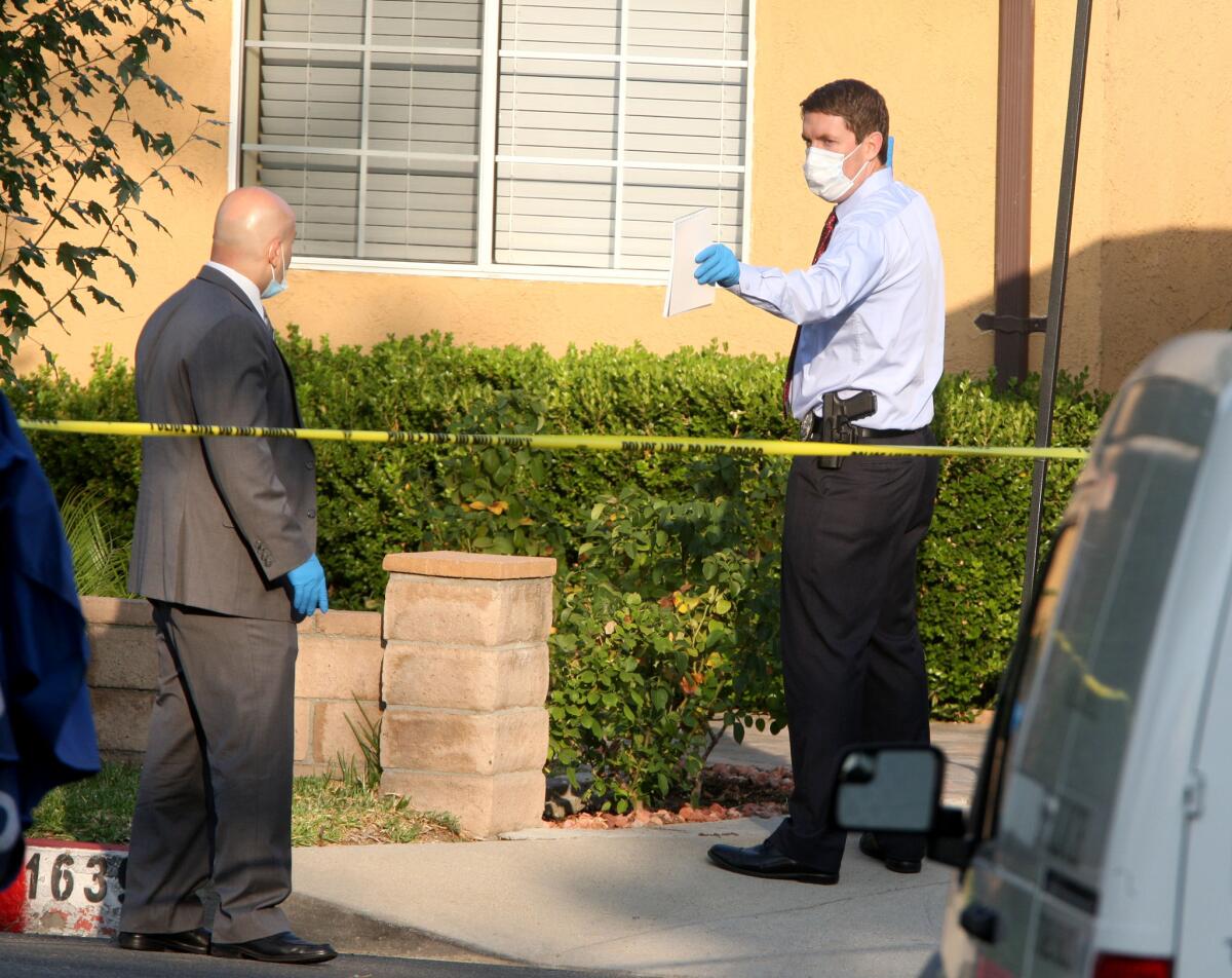 Glendale police investigate the scene where a man was found shot to death on a front yard on the 1600 block of The Midway St. in Glendale on Saturday morning, June 25, 2016.