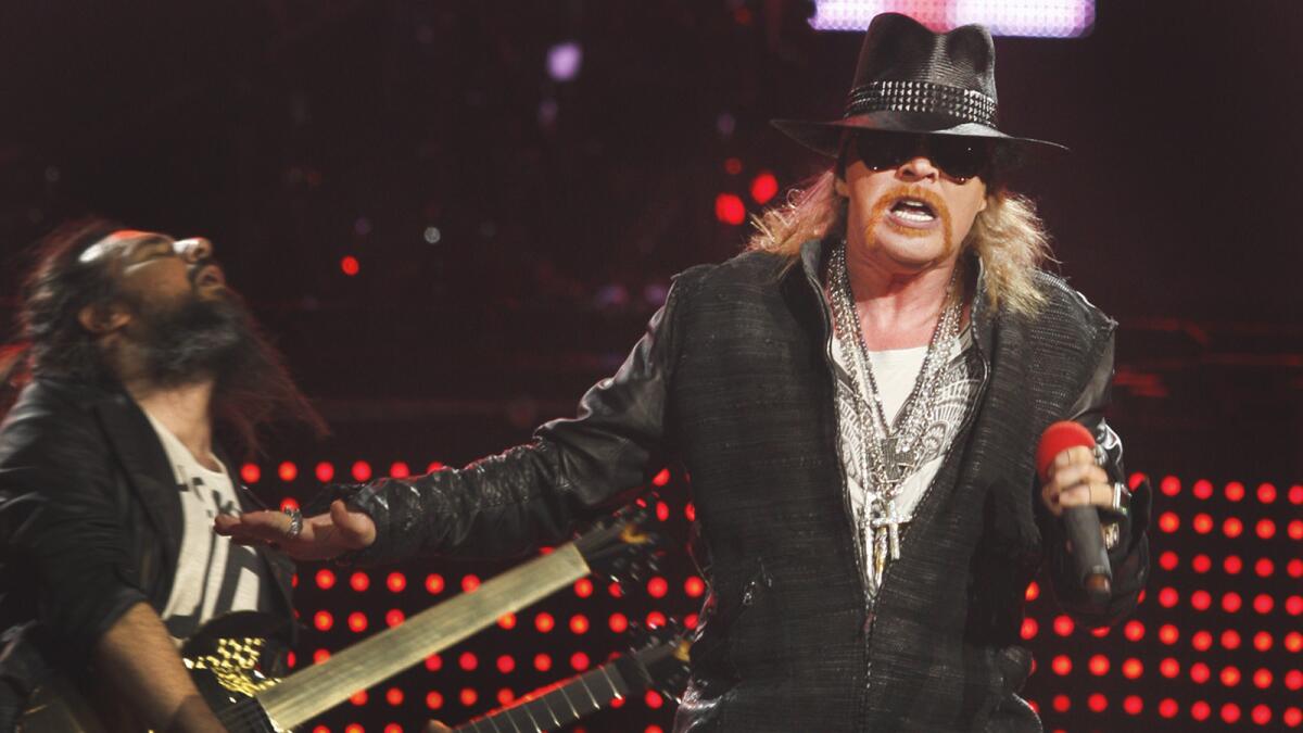 Guns N' Roses lead singer Axl Rose performs with his band in Seattle on Dec. 17, 2011.