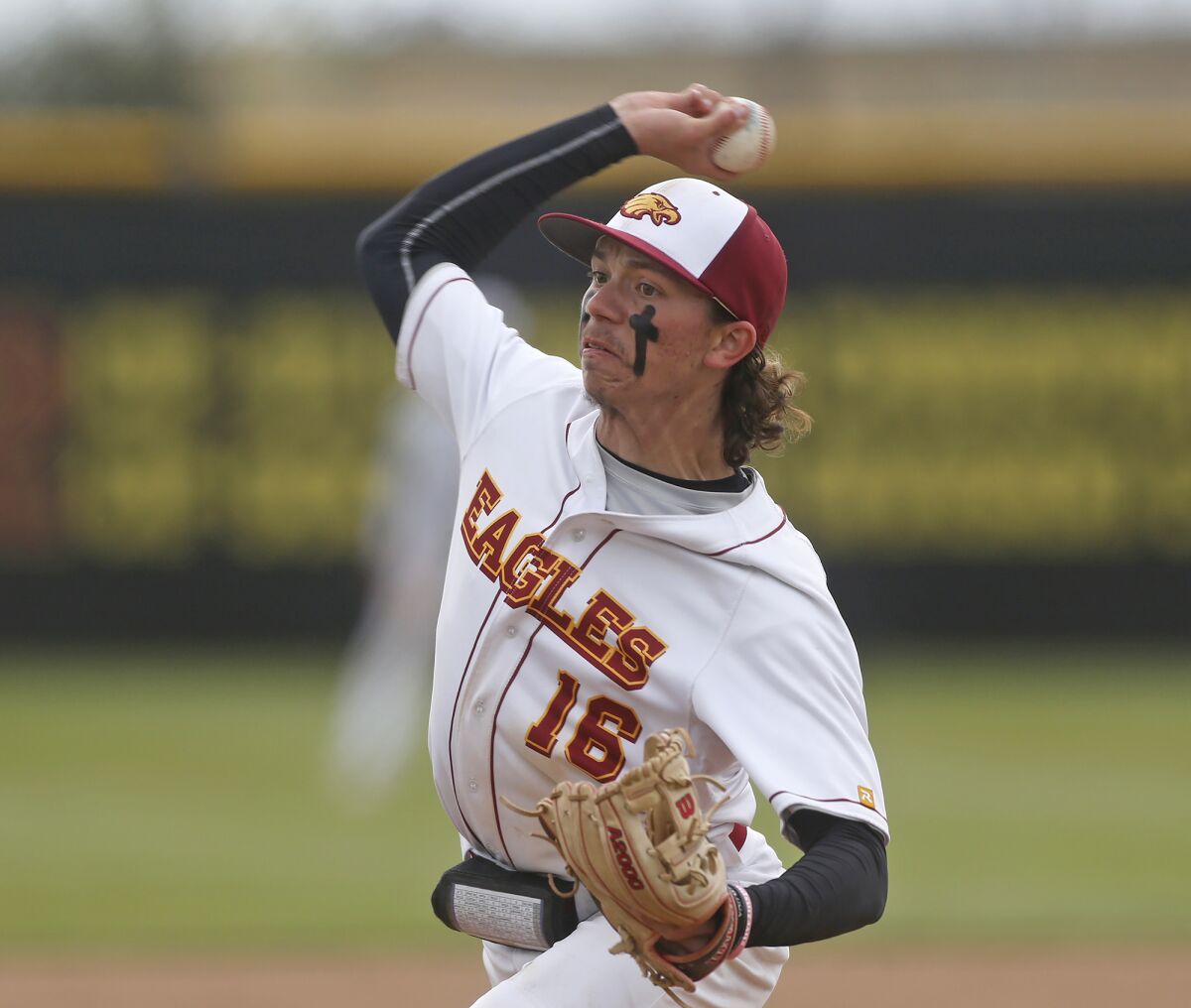Estancia pitcher Andrew Mits throws in the Battle for the Bell baseball game against Costa Mesa on Friday.