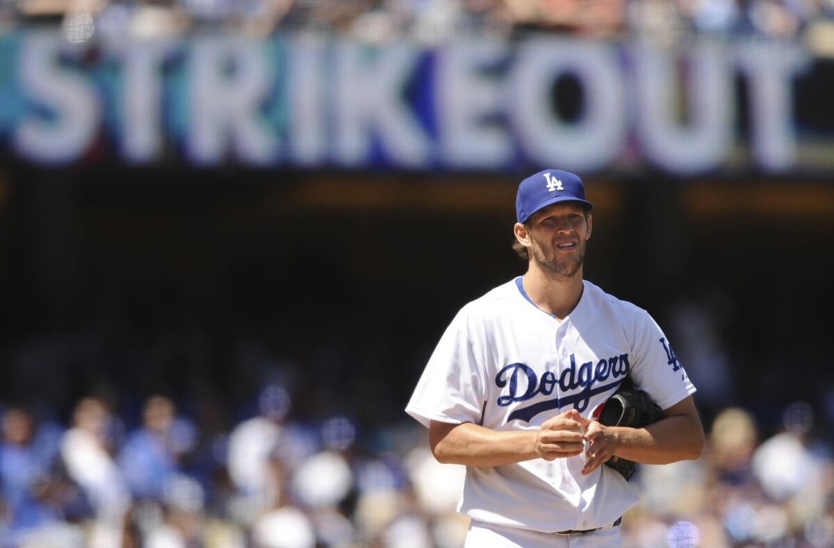 Dodgers pitcher Clayton Kershaw looks on after his first strikeout of the afternoon during a game against the Padres on April 6.