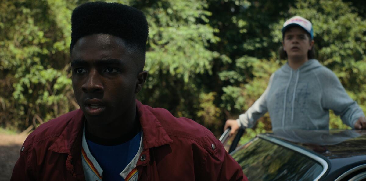 Caleb McLaughlin as Lucas Sinclair and Gaten Matarazzo as Dustin Henderson in "Stranger Things." 