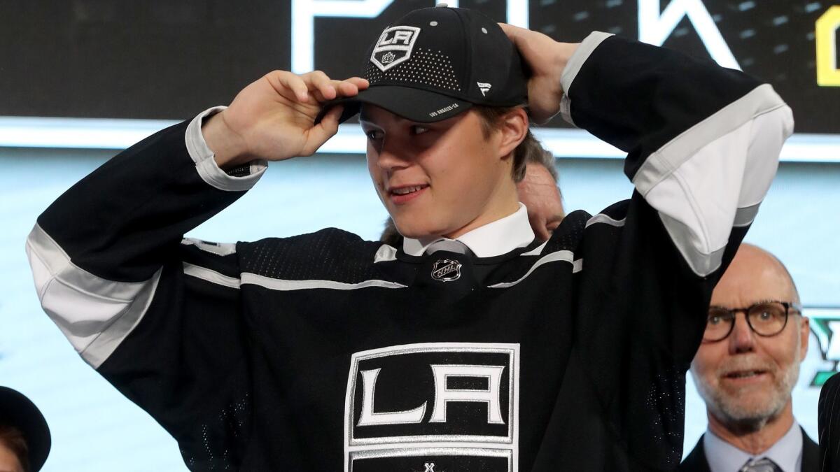 Rasmus Kupari poses after being selected by the Los Angeles Kings during the first round of the 2018 NHL Draft.