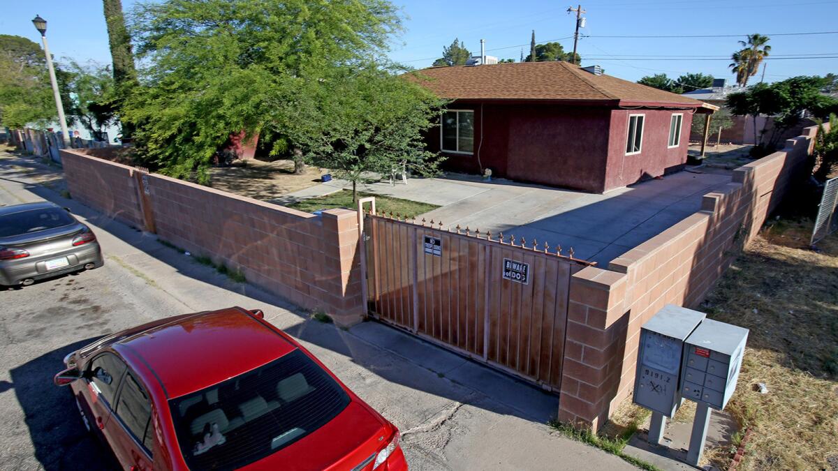 The house on West Calle Medina in Tucson where police say five people died in a murder-suicide.