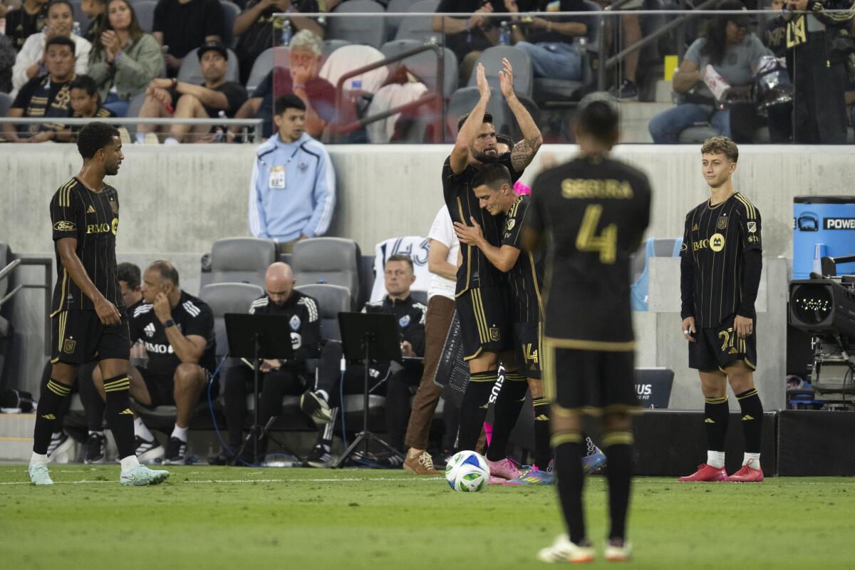 LAFC forward Olivier Giroud acknowledges the fans with applause after he exits during the second half Sunday.