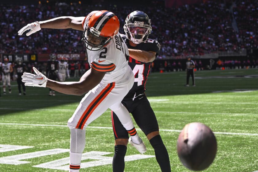 Cleveland Browns wide receiver Amari Cooper (2) misses the catch agaimnst Atlanta Falcons quarterback Desmond Ridder (4) during the second half of an NFL football game, Sunday, Oct. 2, 2022, in Atlanta. (AP Photo/John Amis)