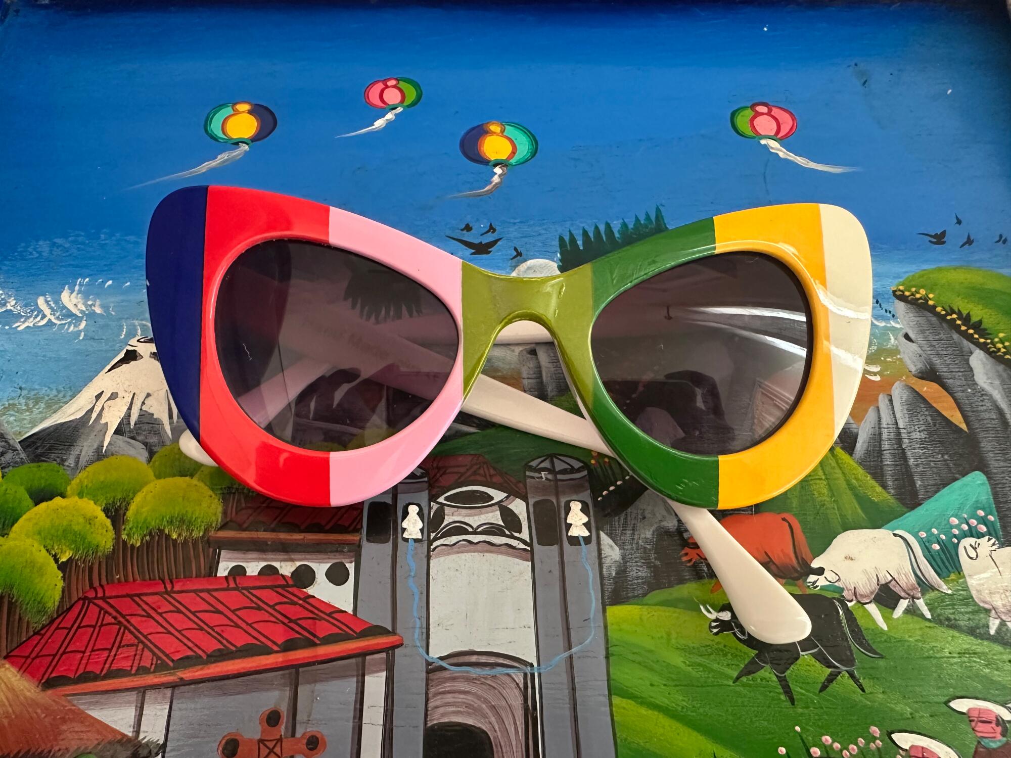 Colorful sunglasses on a colorful table