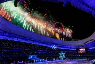 Firework display at the end of the closing ceremony at the Beijing 2022 Olympic games. (Gary Ambrose / For the Times)