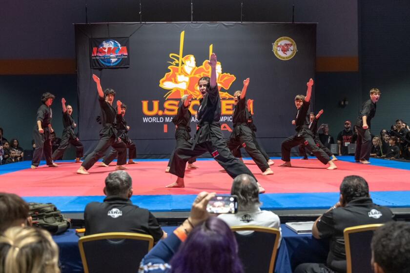 The elite demo performance team from Freestyle Martial Arts performs at the 2023 ISKA U.S. Open world championships.