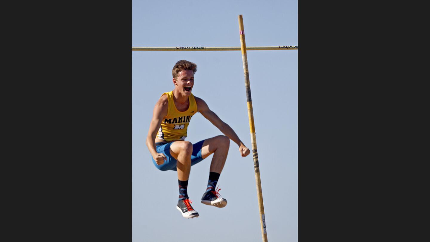 Marina High School's Michael Magula celebrates clearing 14 feet in the Division 2 boys pole vault at the 2017 CIF Southern Section Track & Field Divisional Finals, at Cerritos College in Norwalk on Saturday, May 20, 2017.
