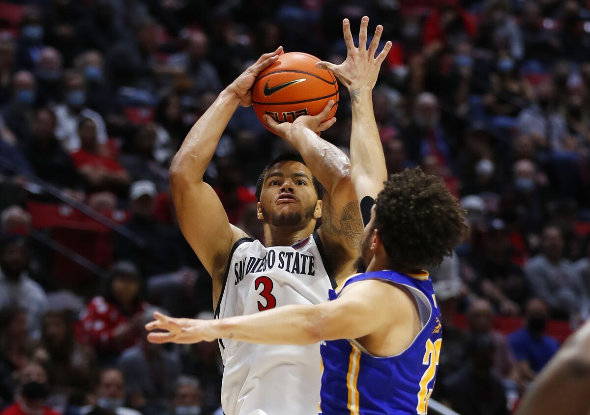 San Diego State's Matt Bradley (3) is fouled by UC Riverside's Dominick Pickett on Tuesday. 