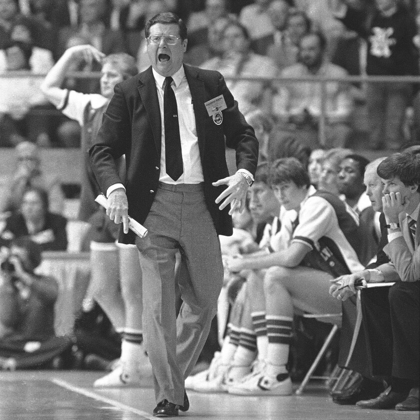 Kentucky basketball coach Joe B. Hall shouts instructions from the sideline.