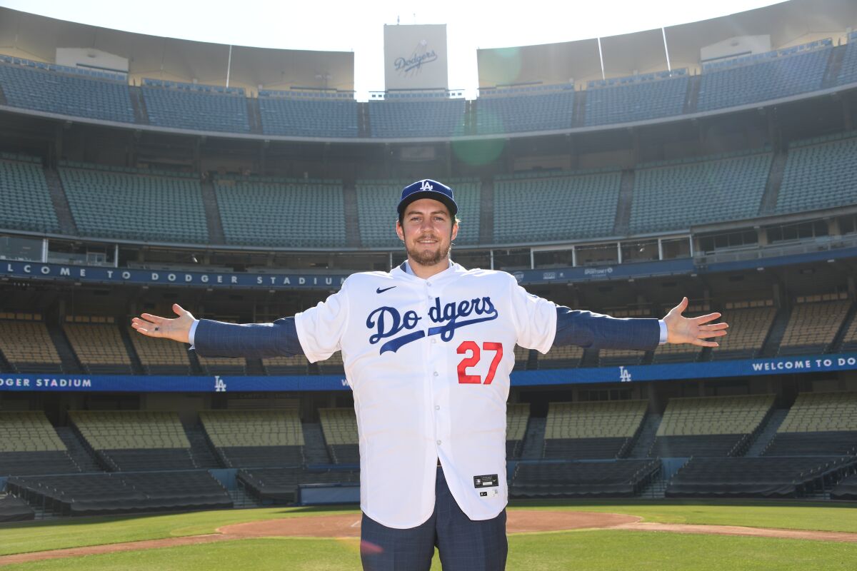 Dodgers pitcher Trevor Bauer stands in Dodger Stadium during his introductory news conference on Thursday.