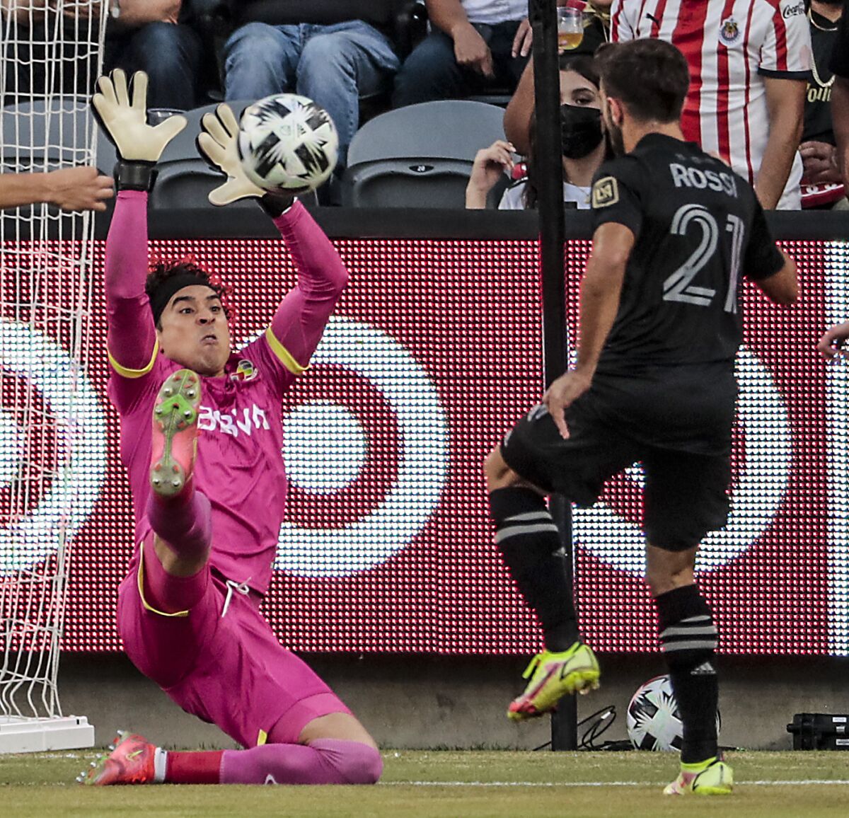 MLS forward Diego Rossi tries to score on Liga MX goalkeeper Guillermo Ochoa 