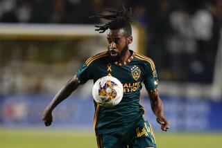 LA Galaxy defender Raheem Edwards traps the ball during the second half of the team's MLS soccer.